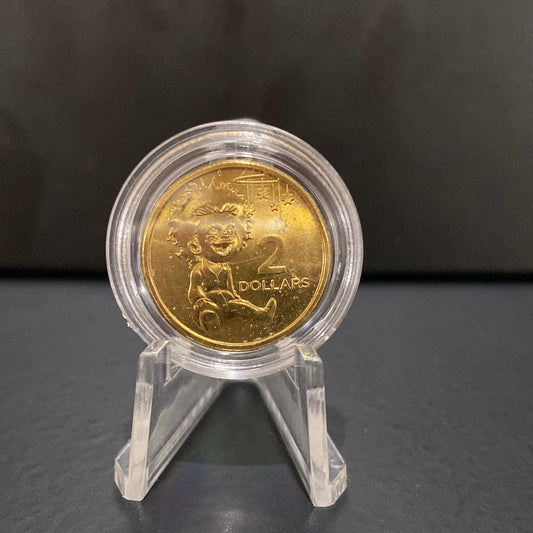 2023 INDIGENOUS BABY UNC $2 in capsule