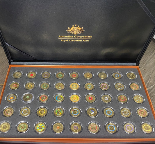 Full set uncirculated $2 coins in including 2012 red Poppy 73 Coins